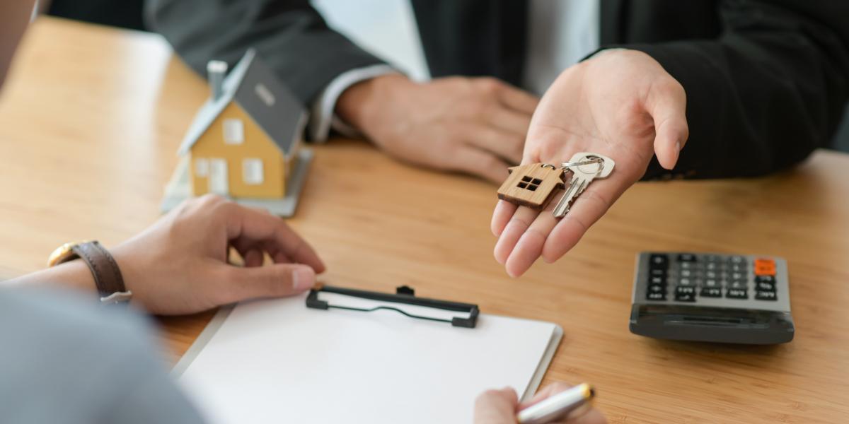 Handing Keys Over To a Home Buyer
