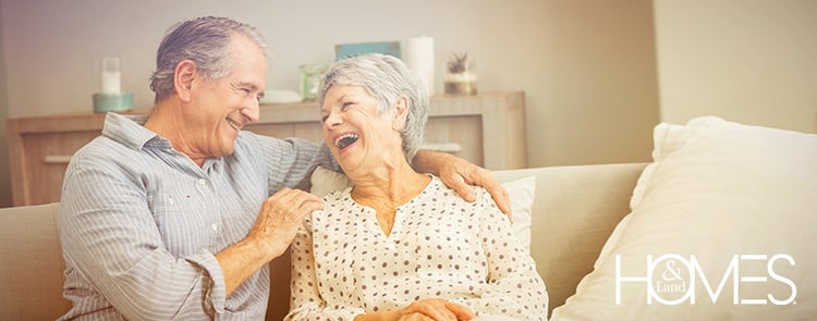 elderly-couple-warm-embrace-laughing-1